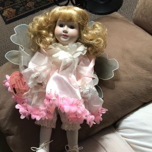 Porcelain musical collectibles doll